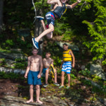 ropeswing jumping water lake woods mountains sleepaway camp boys