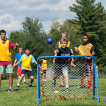 games field boys playing overnight camp new hampshire