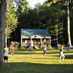 pines field green grass boys playing free time