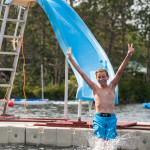 waterfront slide happy camper boys summer camp lake new england water