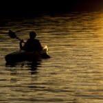 sunset paddle lake water